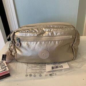 Kipling Gold Cosmetic Bag with Metallic Finish and Zipper Compartments